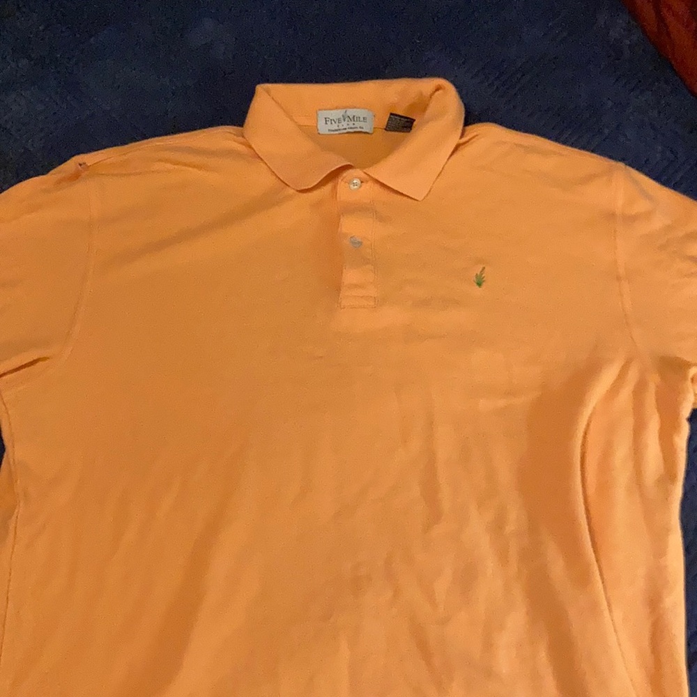 Mile High Club orange polo.